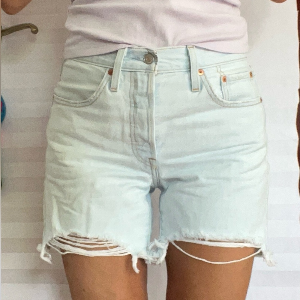 NWOT levi’s super sexy Women’s Light Blue Washed Denim Cutoff Shorts size w26